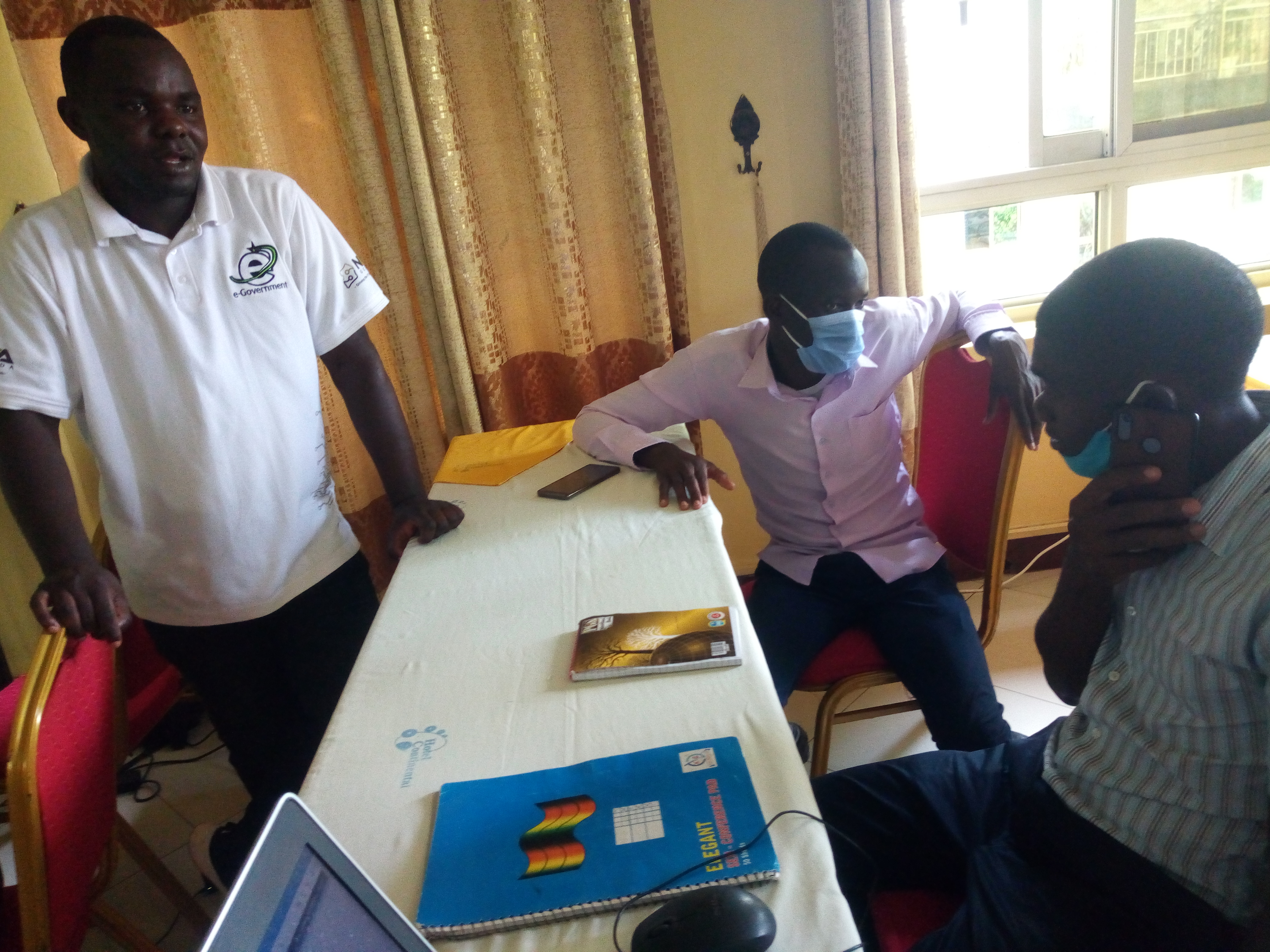 Joshua Ekau (standing), from NITA-U during a training session Training in progress